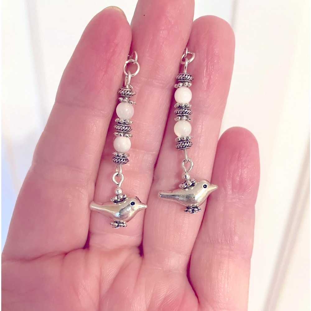 Silver bird and mother of pearl earrings